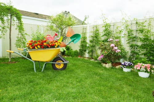 Professional lawn mowing service at work in Kensington